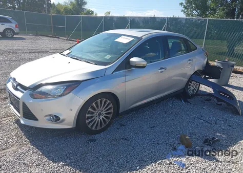 2012 Ford Focus Titanium z USA, uszkodzony, nr VIN 1FAHP3J21CL327807